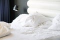 Dirty bed in the hotel. Dirty bed pillow blanket room. Royalty Free Stock Photo