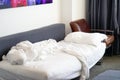 Dirty bed in the hotel. Dirty bed pillow blanket room. Royalty Free Stock Photo