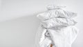 dirty bedclothes and pillows, preparing for washing Royalty Free Stock Photo