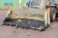 Dirty bulldozer bucket after excavation