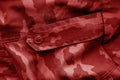 Dirty camouflage cloth in red tone