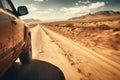 Dirty car on desert highway road. Car trip along desert mountain landscape, closeup side view Royalty Free Stock Photo