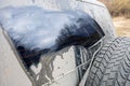 Dirty car rear window. Adventure background. Detail of dirty off-road car Royalty Free Stock Photo