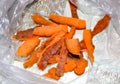 Dirty carrot peelings in a cellophane bag