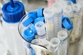 Dirty centrifuge in the beaker after analysis. Falcon tubes with blue caps. Chemical laboratory, August 2020, San