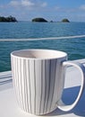 Dirty coffee cup on a sailboat