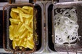 Dirty cooking area with french fries deep fryer. Royalty Free Stock Photo