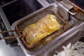 Dirty cooking area with french fries deep fryer. Royalty Free Stock Photo