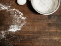 Dirty cooking table with flour and bowl