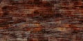 Dirty dark orange brown red wooden surface with scratched grey messy parts. Grunge wood laminate
