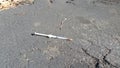 Dirty discarded needle