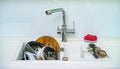 Dirty dishes. Plates and kitchen utensils after dinner. Kitchen sink with dirty plates. Royalty Free Stock Photo