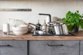 Dirty dishes and unwashed kitchen appliances filled the kitchen sink Royalty Free Stock Photo