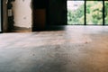 Dirty dusty wooden floor with shavings indoors