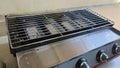 dirty electric grill stove in the kitchen Royalty Free Stock Photo