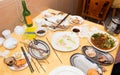 Dirty empty bowl and spoon dish after tasty breakfast Royalty Free Stock Photo