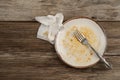 A dirty empty plate on wooden table after dinner Royalty Free Stock Photo