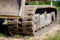 Excavator tracks on the ground