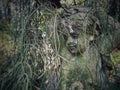 Dirty face of little cupid angel sculpture statue. Royalty Free Stock Photo