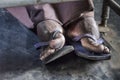 Dirty feet in flip-flops Royalty Free Stock Photo