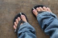 Dirty feet of a man wearing sandal Royalty Free Stock Photo