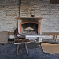 Dirty fireplace in abandoned interior