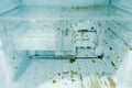 Dirty freezer of modern frigerator with splash