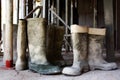 Dirty galoshes at a construction site Royalty Free Stock Photo