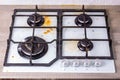 Dirty gas hob soiled in cooking stove in grease. Unsanitary conditions