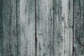 A dirty gray-green wooden surface. Grey wooden dilapidated boards. Wood plank texture background. Old wooden table, fence, timber, Royalty Free Stock Photo