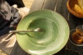 Dirty Green Plate, Empty Bowl after Dinner Royalty Free Stock Photo