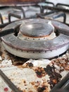 The Dirty and Grimy and Rusted Top of Gas Cooker Hob with Bits o Royalty Free Stock Photo