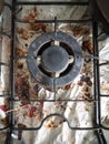 The Dirty and Grimy and Rusted Top of Gas Cooker Hob with Bits o Royalty Free Stock Photo