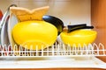 Dirty grubby drainer with clean dishes in kitchen. Royalty Free Stock Photo