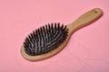 Dirty hair brush, Grey lint dead skin cell residue on unclean comb, Poor hygiene head scalp