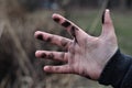 Dirty hand, a hand through his soot Royalty Free Stock Photo