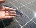 Dirty Hand after Rubbing Dusty Solar Panel Royalty Free Stock Photo
