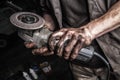 Dirty hands with angle grinder Royalty Free Stock Photo