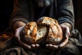 Dirty hands homeless poor man with piece of bread in modern capitalism society. Economic recession, unemployment, poverty, hunger