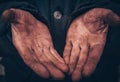 Dirty hands of a man, a working man, a man drained his hands while working, a poor man Royalty Free Stock Photo