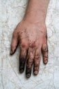 Dirty hands of a worker after a hard day\'s work Royalty Free Stock Photo