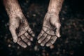 Dirty hands of worker miner are corns palms in abrasions. Concept hard work