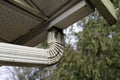Dirty house exterior clogged gutter and downspout Royalty Free Stock Photo