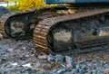 Dirty iron tracks on an excavator