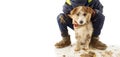 DIRTY  JACK RUSSELL DOG AND LITTLE BOY CHILD.  AFTER PLAY IN A MUD PUDDLE. ISOLATED SHOT AGAINST WHITE BACKGROUND Royalty Free Stock Photo