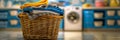 Dirty laundry basket with washing machine on blurred background, copy space available Royalty Free Stock Photo