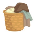 Clothes and linen laundry in wicker basket isolated object Royalty Free Stock Photo