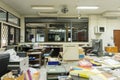 Dirty, messy and abandoned office, poor light Royalty Free Stock Photo