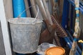 dirty metal bucket, rusty shovel and rake. old rusty garden tools Royalty Free Stock Photo