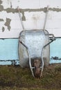 Dirty metal wheelbarrow Royalty Free Stock Photo